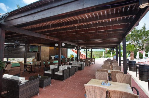 Outside terrace at Adelais Bay Hotel in Protaras, Cyprus. Travel with World Lifetime Journeys