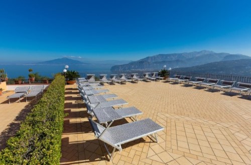 Terrace lounges at Hotel La Vue D’Or in Sorrento, Italy. Travel with World Lifetime Journeys