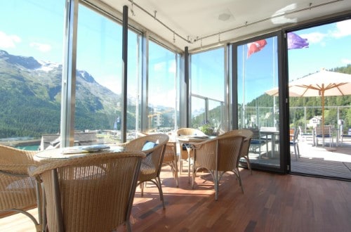 Terrace place at Hotel Monopol in St. Moritz, Switzerland. Travel with World Lifetime Journeys