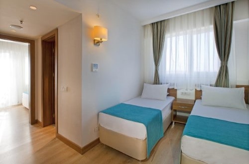 Twin room at Grand Park Lara Hotel in Antalya, Turkey. Travel with World Lifetime Journeys