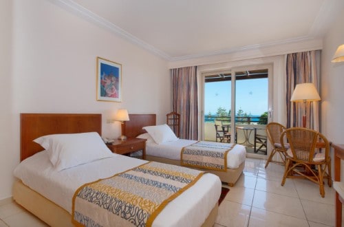 Twin room at Iberostar Creta Marine in Crete, Greece. Travel with World Lifetime Journeys