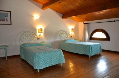 Twin room at Liscia Eldi Resort in San Teodoro, Sardinia. Travel with World Lifetime Journeys