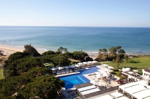 View of pool and sea at Club Med Da Balaia Resort, Albufeira, Portugal. Travel with World Lifetime Journeys