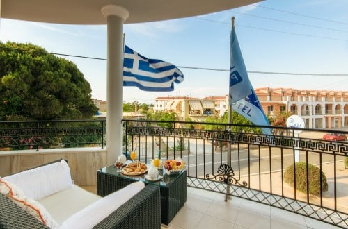 Balcony view at Plaza Pallas Hotel in Zakynthos, Greece. Travel with World Lifetime Journeys