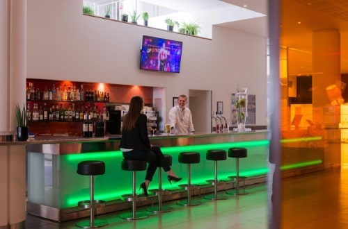 Bar area at Novotel Paris Est in Paris, France. Travel with World Lifetime Journeys