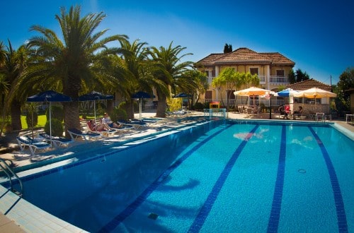 Beautiful pool side at Alykes Garden Village in Zakynthos, Greece. Travel with World Lifetime Journeys