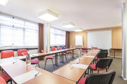 Conference room at Canal Suites Hotel La Villette in Paris, France. Travel with World Lifetime Journeys