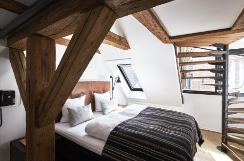 Double room at 71 Nyhavn Hotel in Copenhagen, Denmark. Travel with World Lifetime Journeys