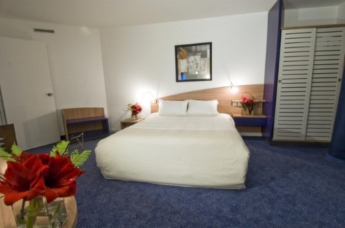 Double room at Canal Suites Hotel La Villette in Paris, France. Travel with World Lifetime Journeys