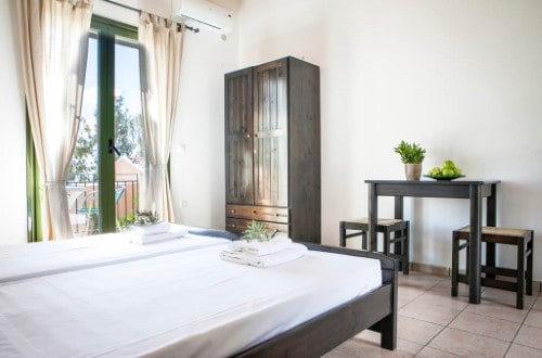 Double room at Lovides Studios in Kefalonia, Greece. Travel with World Lifetime Journeys