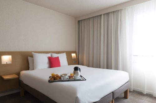 Double room at Novotel Paris Est in Paris, France. Travel with World Lifetime Journeys