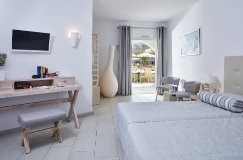 Double room at Aegean Plaza Hotel in Santorini, Greece. Travel with World Lifetime Journeys