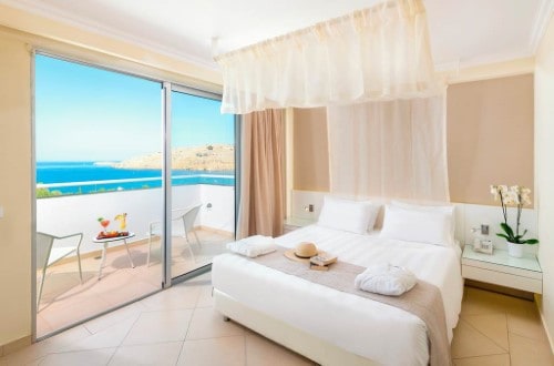 Double room at Lindos Village Resort in Rhodes, Greece. Travel with World Lifetime Journeys