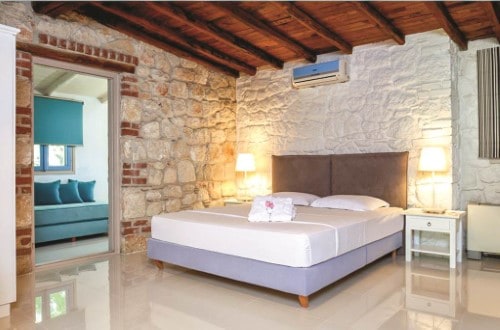 Double room at Petrino Suites in Halkidiki, Greece. Travel with World Lifetime Journeys