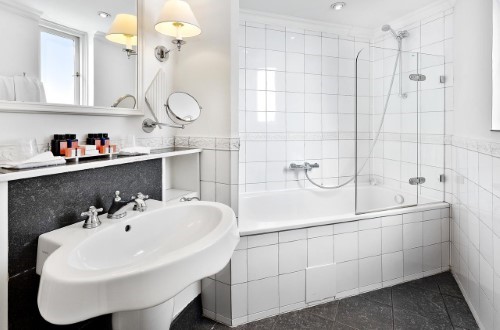 Ensuite bath at Copenhagen Plaza in Copenhagen, Denmark. Travel with World Lifetime Journeys