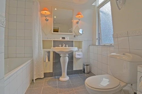 Ensuite bath at Copenhagen Plaza in Copenhagen, Denmark. Travel with World Lifetime Journeys