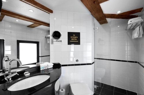 Ensuite bathroom at 71 Nyhavn Hotel in Copenhagen, Denmark. Travel with World Lifetime Journeys