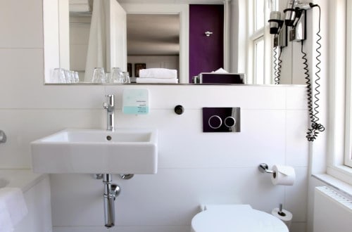 Ensuite bathroom at Absalon Hotel in Copenhagen, Denmark. Travel with World Lifetime Journeys