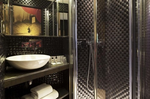 Ensuite bathroom at Hotel Montmartre Mon Amour in Paris, France. Travel with World Lifetime Journeys