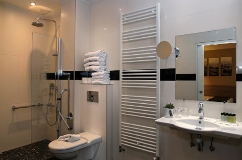 Ensuite bathroom at Hotel l’Interlude in Paris, France. Travel with World Lifetime Journeys