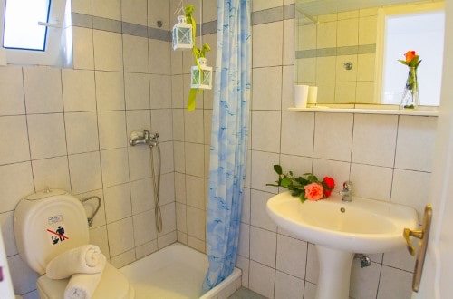 Ensuite bathroom at Alykes Garden Village in Zakynthos, Greece. Travel with World Lifetime Journeys