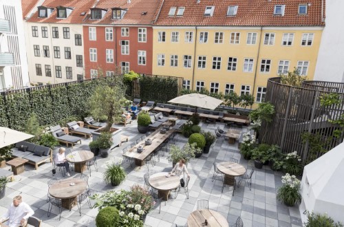 Hotel garden at Skt Petri Hotel in Copenhagen, Denmark. Travel with World Lifetime Journeys