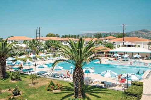 Pool view at Golden Sun Hotel in Zakynthos, Greece. Travel with World Lifetime Journeys