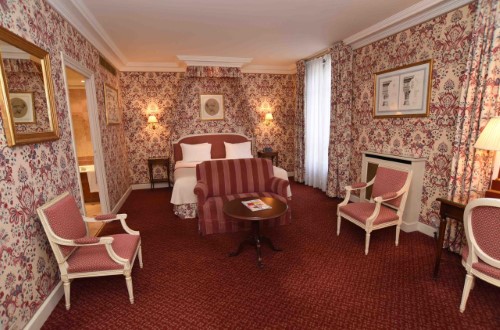 Junior suite at Victoria Palace Hotel in Paris, France. Travel with World Lifetime Journeys