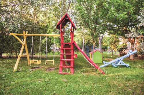 Kids playground at Petrino Suites in Halkidiki, Greece. Travel with World Lifetime Journeys