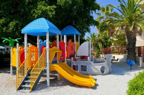 Kids playground at Sun Beach Resort Complex Hotel in Rhodes, Greece. Travel with World Lifetime Journeys