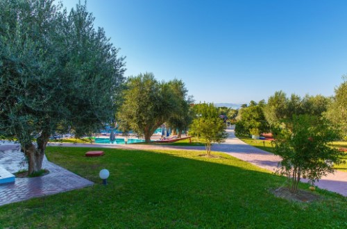 Lovely garden at Filoxenia Apartments in Rhodes, Greece. Travel with World Lifetime Journeys