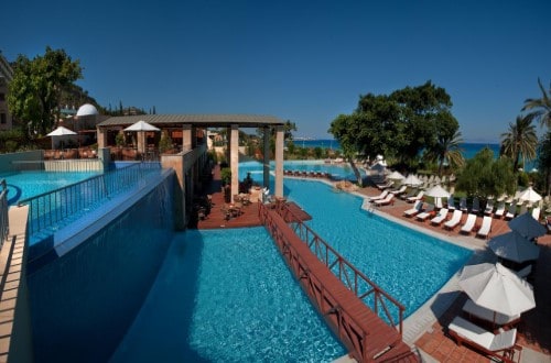 Lovely pool at Amathus Beach Hotel in Rhodes, Greece. Travel with World Lifetime Journeys