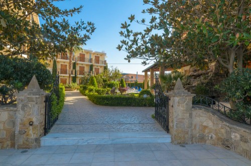 Main entrance at Plaza Pallas Hotel in Zakynthos, Greece. Travel with World Lifetime Journeys