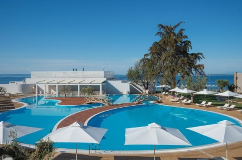 Pool area at Ikos Olivia on Halkidiki Peninsula, Greece. Travel with World Lifetime Journeys