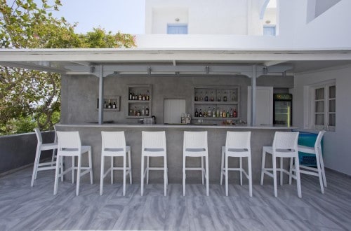 Pool bar at Alexandra Hotel in Santorini, Greece. Travel with World Lifetime Journeys