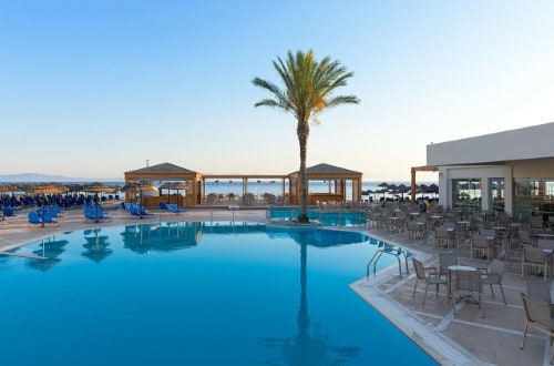 Pool side at Avra Beach Hotel in Rhodes Island, Greece. Travel with World Lifetime Journeys