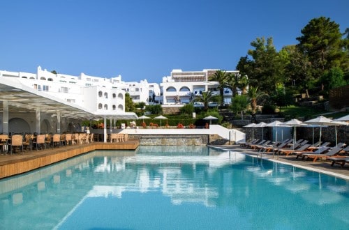 Pool side at Lindos Village Resort in Rhodes, Greece. Travel with World Lifetime Journeys