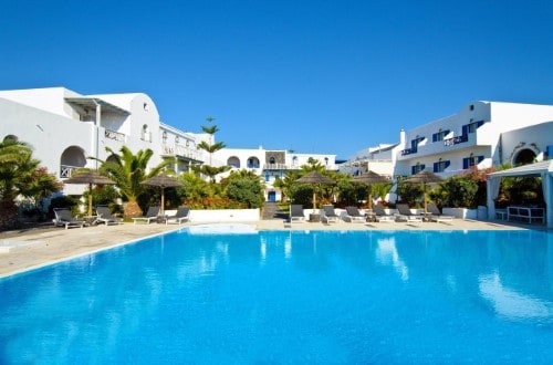 Pool side at Mediterranean White Hotel in Santorini, Greece. Travel with World Lifetime Journeys