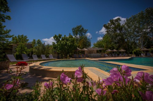 Pool side at Petrino Suites in Halkidiki, Greece. Travel with World Lifetime Journeys