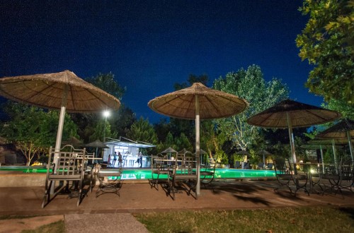 Pool side terrace at Petrino Suites in Halkidiki, Greece. Travel with World Lifetime Journeys