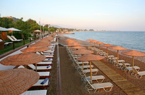 Private beach area at Amathus Beach Hotel in Rhodes, Greece. Travel with World Lifetime Journeys