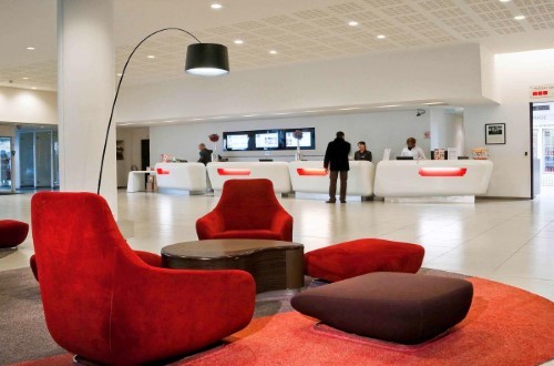 Reception area at Novotel Paris Est in Paris, France. Travel with World Lifetime Journeys