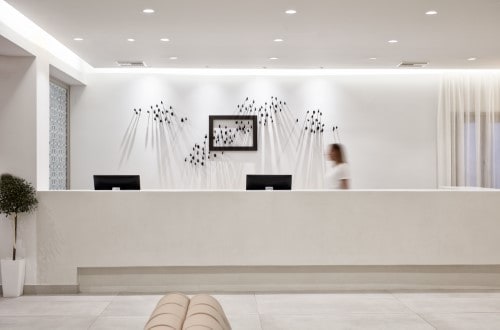 Reception area at Costa Grand Resort & Spa in Santorini, Greece. Travel with World Lifetime Journeys