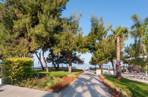 Way to the beach at Portes Beach Hotel in Halkidiki, Greece. Travel with World Lifetime Journeys