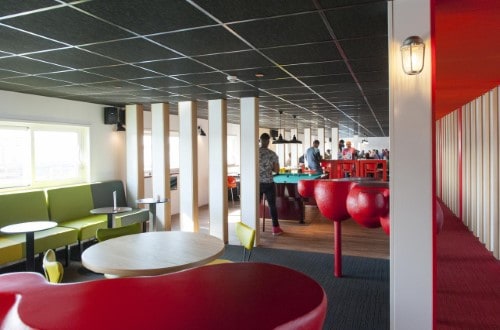 Bar area & Games room at Amstel Botel in Amsterdam, Netherlands. Travel with World Lifetime Journeys