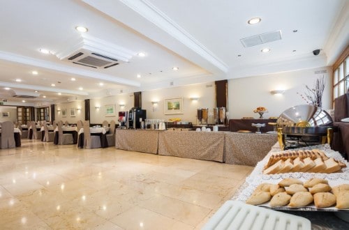 Breakfast room at Hotel Gran Versalles in Madrid, Spain. Travel with World Lifetime Journeys