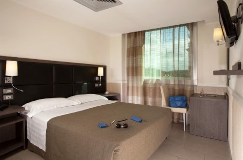 Double room at Artis Hotel Rome in Rome, Italy. Travel with World Lifetime Journeys