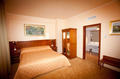 Double room at Hotel Maxim in Oradea, Romania. Travel with World Lifetime Journeys