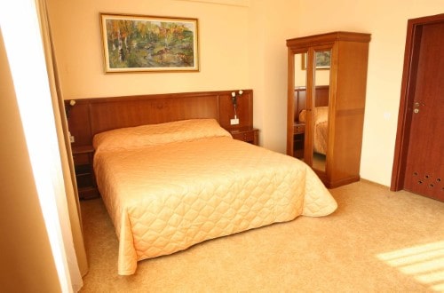 Double room at Hotel Maxim in Oradea, Romania. Travel with World Lifetime Journeys