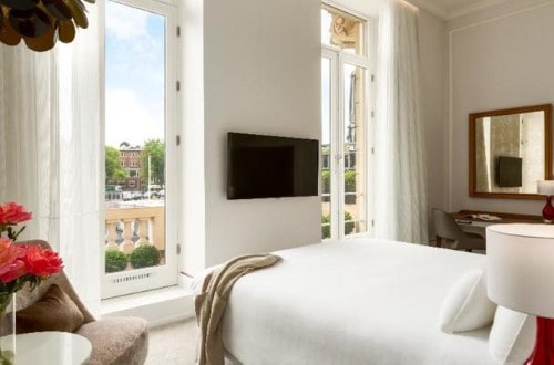 Double room at NH Collection Amsterdam Doelen in Netherlands. Travel with World Lifetime Journeys